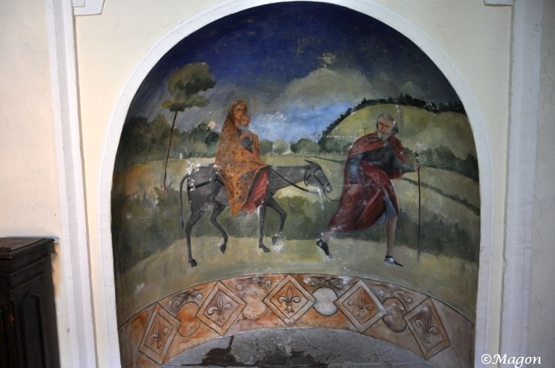Фреска в арочном нише Castello Di Amorosa: Мария на осле, Иосиф с посохом